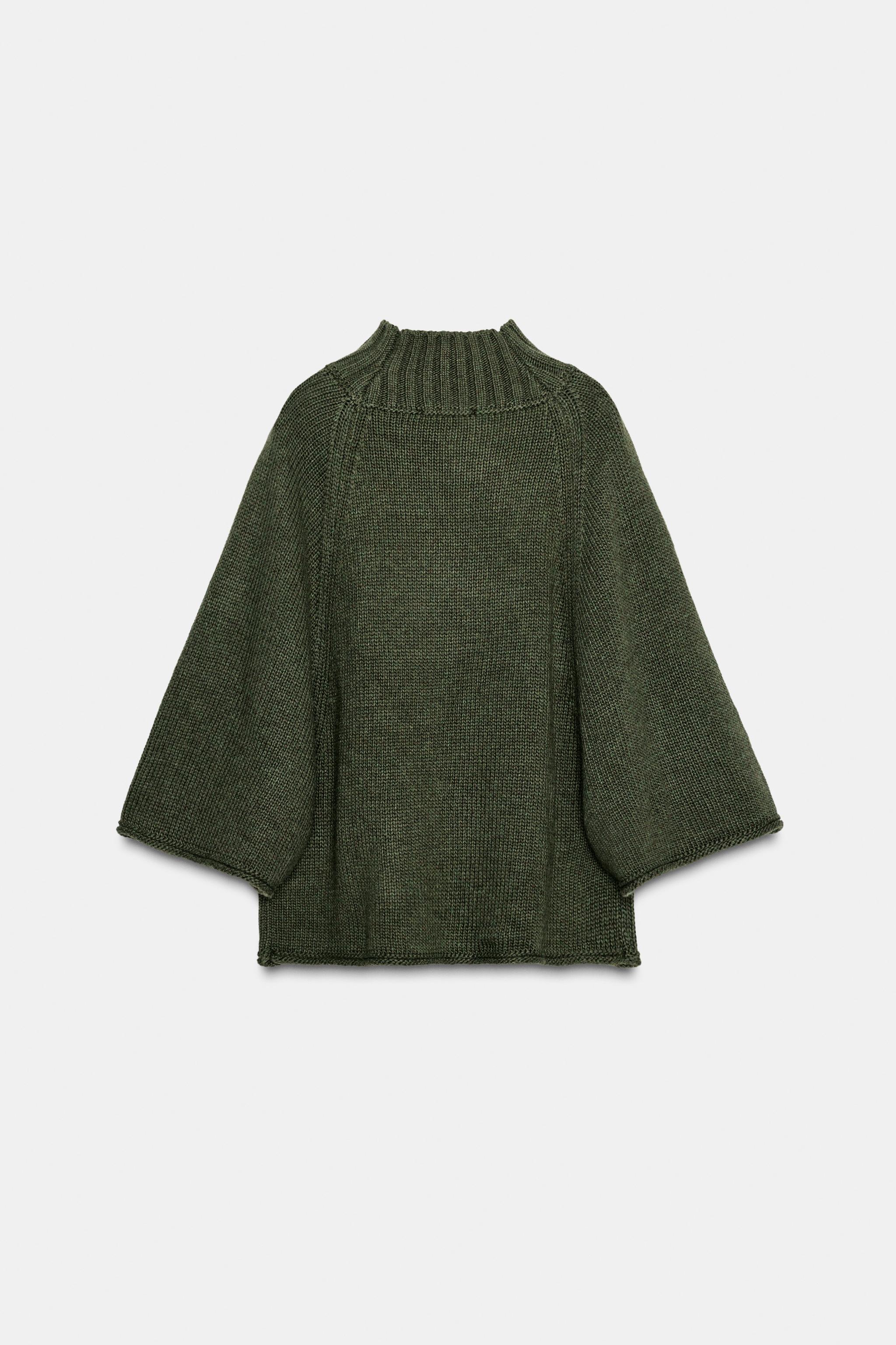 KNIT CAPE SWEATER